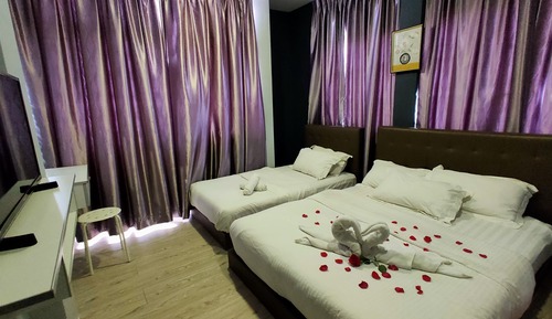 Deluxe Triple Room