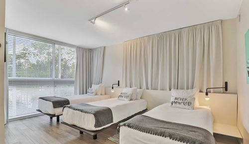 2 Bedrooms: One King, Three Twins