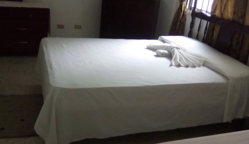 Basic Quadruple Room, 2 Double Beds, Balcony, Garden View
