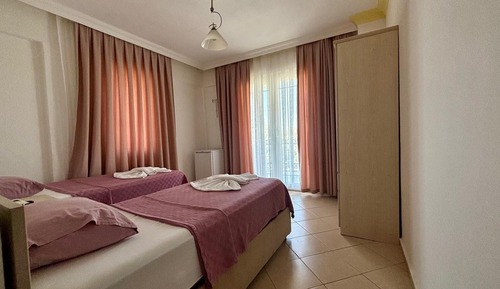 2 Tek Yatakli Oda Balkonlu