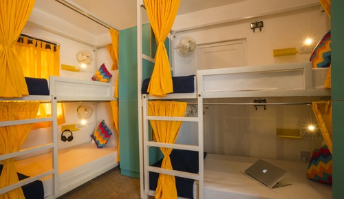 Bed in 12 Bed Mixed AC Dormitory Room with Shared Bathroom
