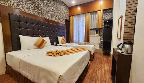 Deluxe Triple Room, City View