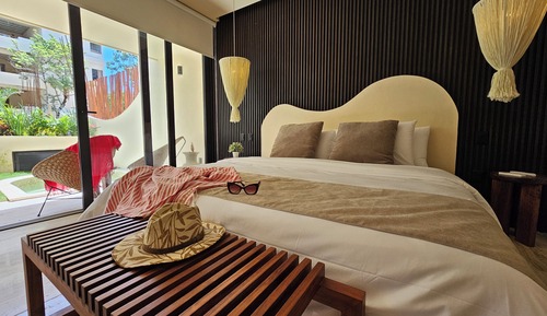 One-bedroom apartment with terrace, plunge pool, and garden