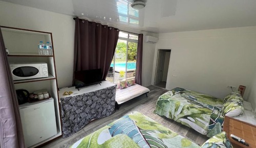 Classic Quadruple Room, Pool View, Garden Area
