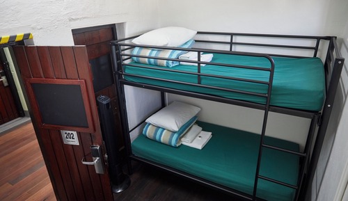 Twin Cell with Shared Bathroom