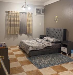 Two-Bedroom Deluxe Apartment with Garden View