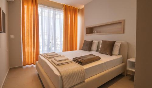 One-Bedroom Apartment with Balcony and City View