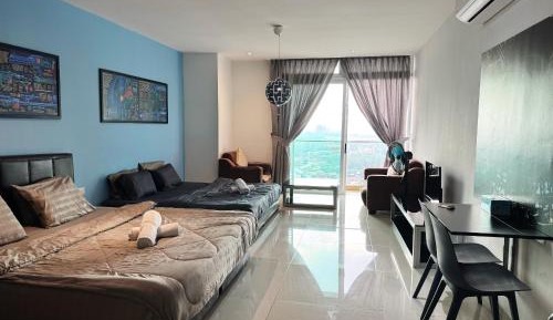 One-Bedroom Apartment with Balcony and City View