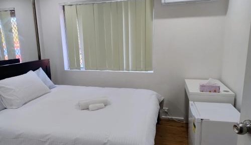 Queen Room with Shared Bathroom
