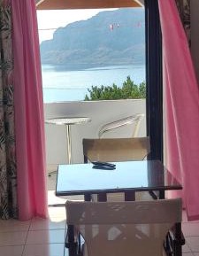 One-Bedroom Apartment with Balcony and Sea View