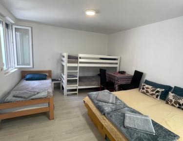 Quadruple Room with Private Bathroom