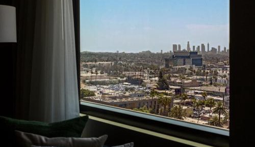 Essential Queen Room with Two Queen Beds and City View
