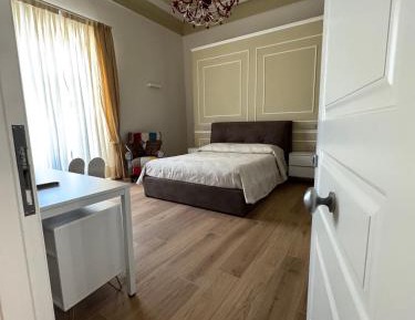 Quadruple Room with Private Bathroom