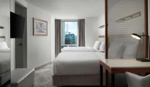 Studio with Two Double Beds with Sofa Bed and City View - High Floor