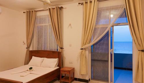Two-Bedroom Apartment with Balcony and Sea View