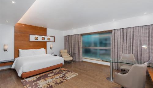 Deluxe Room  with Bathtub & 15% Discount on Food & Soft Beverage & Laundry and 20% discount on SPA services.