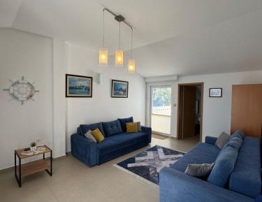 One-Bedroom Apartment with Balcony and Sea View