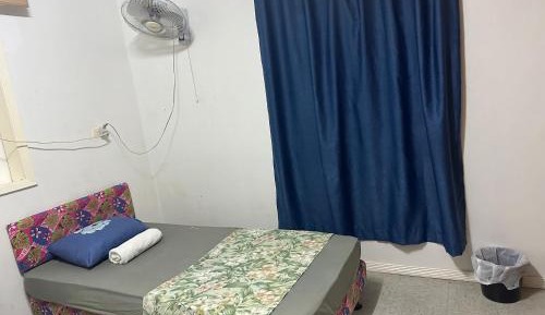 Single Bed in Female Dormitory Room