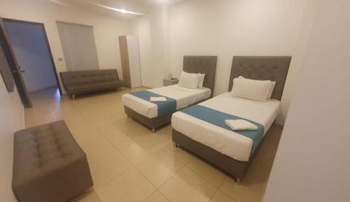Single Bed in Dormitory Room