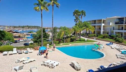 One-Bedroom Apartment with Balcony and with Pool and Ria View