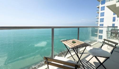 One-Bedroom Apartment with Balcony and Sea View