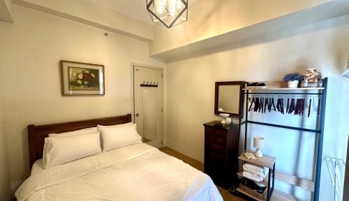 One-Bedroom Apartment with Balcony and City View