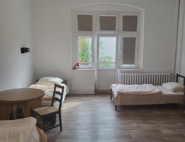 Quadruple Room with Shared Bathroom