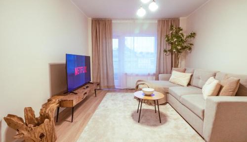 One-Bedroom Apartment with Balcony and City View