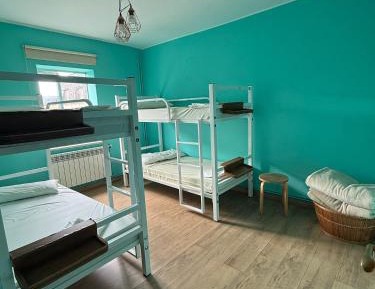 Quadruple Room with Shared Bathroom