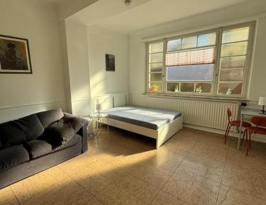 Quadruple Room with Shared Bathroom