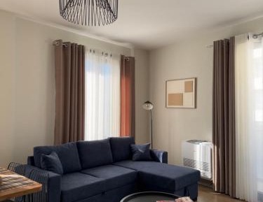 One-Bedroom Apartment with Balcony and City View