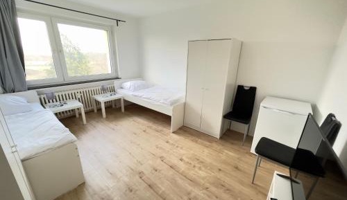 Three-Bedroom Apartment with Balcony