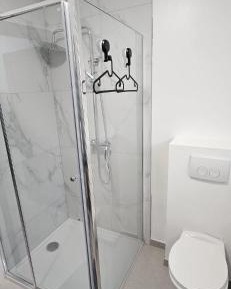 Queen Room with Shared Bathroom