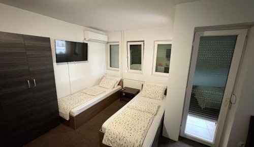 One-Bedroom Apartment with Balcony and City View