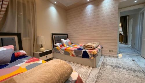 Three-Bedroom Apartment with Water View