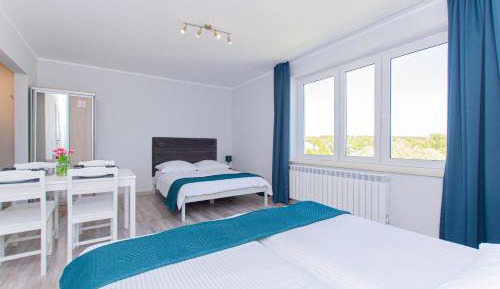 Quadruple Room with Balcony