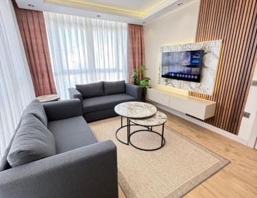 One-Bedroom Apartment with Balcony and City View