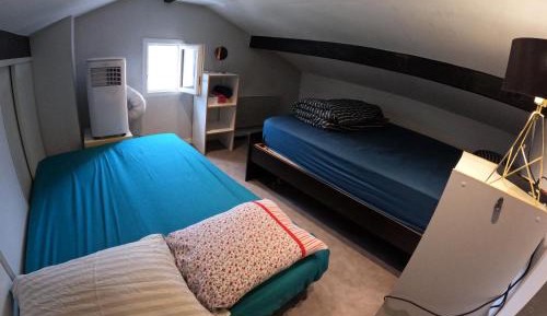 Economy Quadruple Room with Shared Bathroom