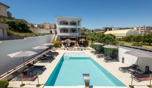 Deluxe Triple Room with Balcony and Garden View
