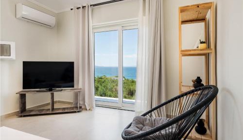 One-Bedroom Apartment with Balcony and Sea View