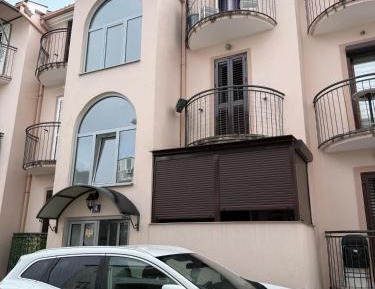 One-Bedroom Apartment with Balcony and City View