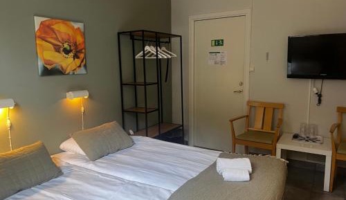 Quadruple Room with Shared Bathroom
