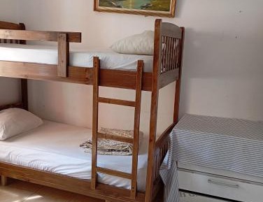 Single Bed in Dormitory Room