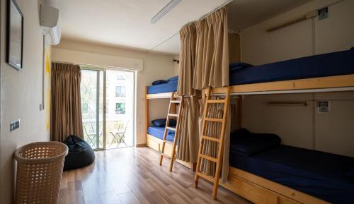Bed in 6-Bed Female Dormitory Room