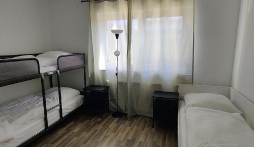 Three-Bedroom Apartment with Balcony