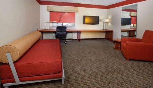 Two-Bedroom Suite with One King Bed and Two Double Beds