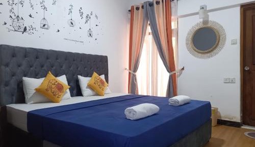 Deluxe Double Room (2 Adults + 1 Child)