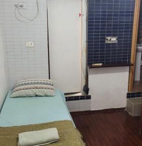 Single Bed in Male Dormitory Room with Shared Bathroom