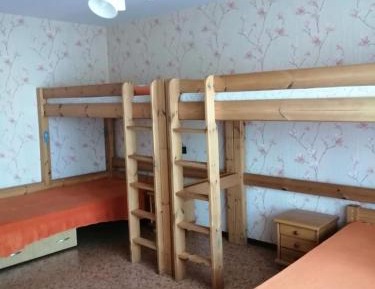 Quadruple Room with Shared Bathroom