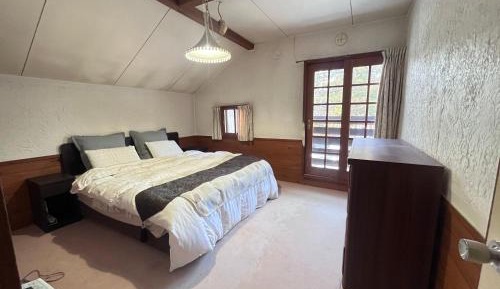 Queen Room with Shared Bathroom